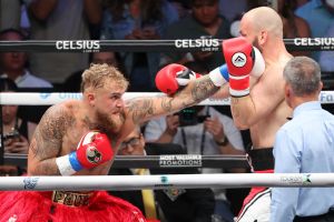 Jake Paul (L) fights Ryan Bourland during their cruiserweight fight at Coliseo de Puerto Rico on March 2, 2024 in Hato Rey, Puerto Rico.