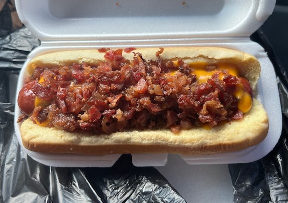 Nacho cheese and bacon hot dawg