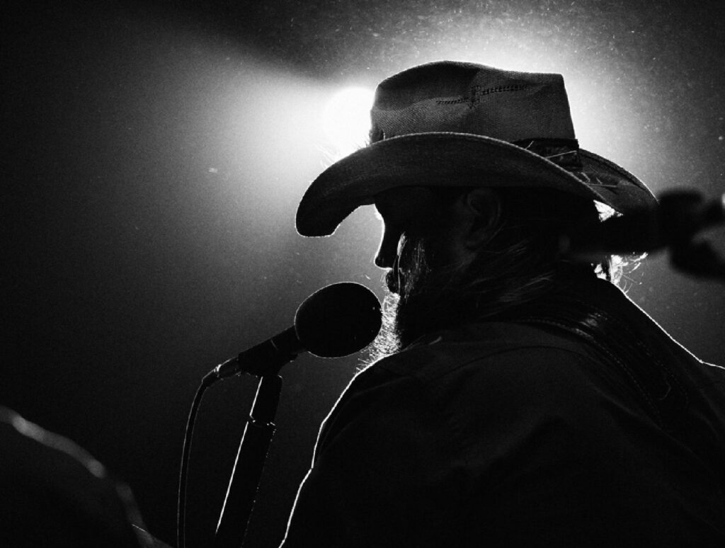 Chris Stapleton Played An April Fool's Joke - Chris in silhouette in black and white. 